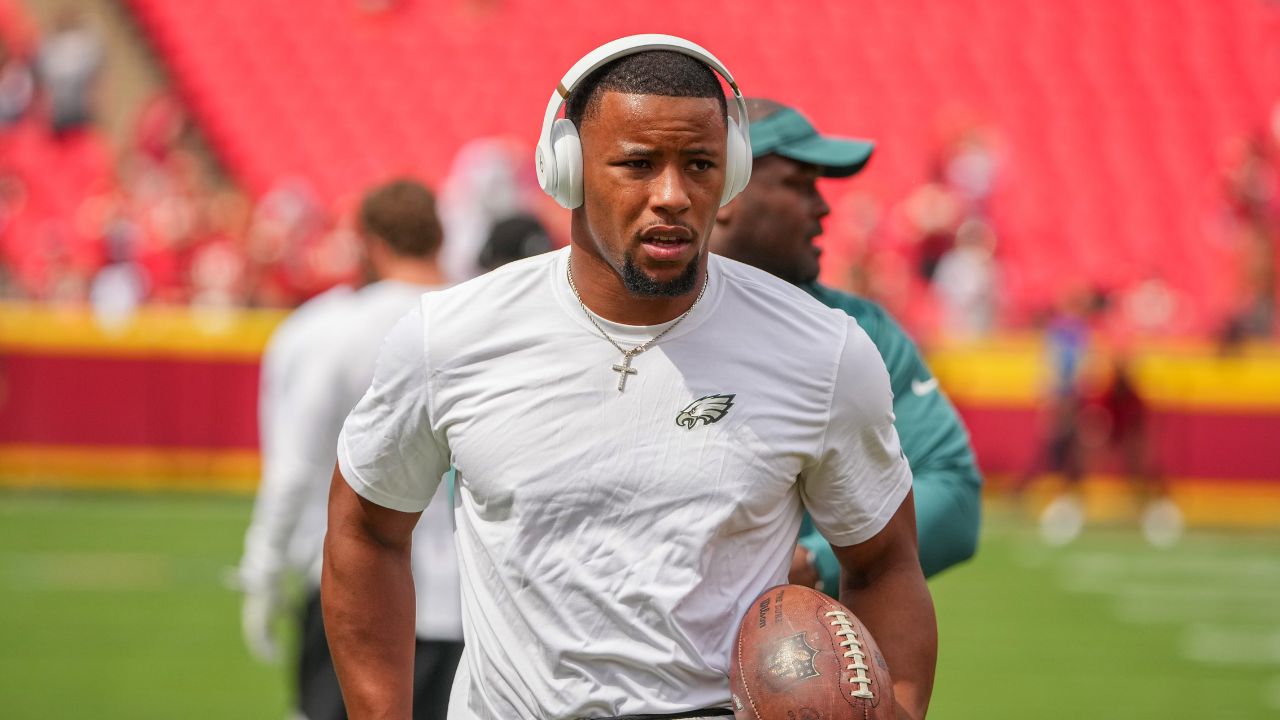 Philadelphia Eagles running back Saquon Barkley (26) warms up against the Kansas City Chiefs prior to a game at GEHA Field at Arrowhead Stadium.