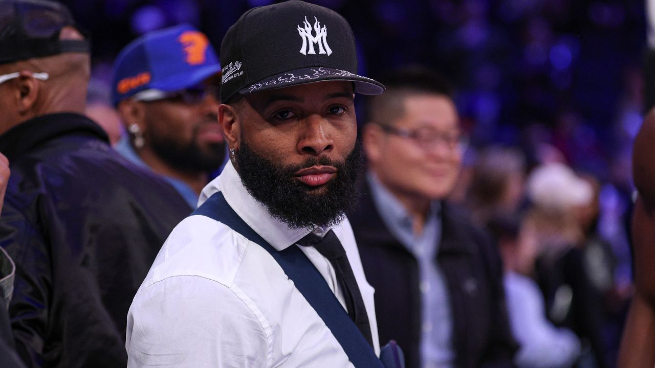 Apr 6, 2025; New York, New York, USA; NFL wide receiver Odell Beckham Jr. sits courtside during the second half of the NBA game between the New York Knicks and the Phoenix Suns at Madison Square Garden.