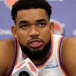Sep 23, 2025; New York, NY, USA; New York Knicks center Karl-Anthony Towns speaks to the media during a media day press conference at the Madison Square Garden training center