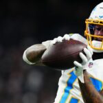 Los Angeles Chargers wide receiver Keenan Allen (13) warms up before the game against the Las Vegas Raiders at Allegiant Stadium.