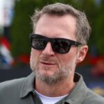 Jul 19, 2025; Dover, Delaware, USA; NASCAR Xfinity Series owner Dale Earnhardt Jr. looks on from pit road during the BetRivers 200 at Dover Motor Speedway