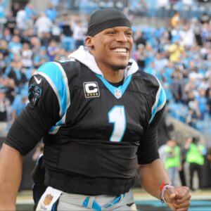 Carolina Panthers quarterback Cam Newton (1) celebrates as his team goes 13-0 against the Atlanta Falcons at Bank of America Stadium. Panthers win 38-0.