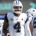 Dallas Cowboys quarterback Dak Prescott (4) looks towards the sidelines during the first half against the New York Jets at MetLife Stadium.