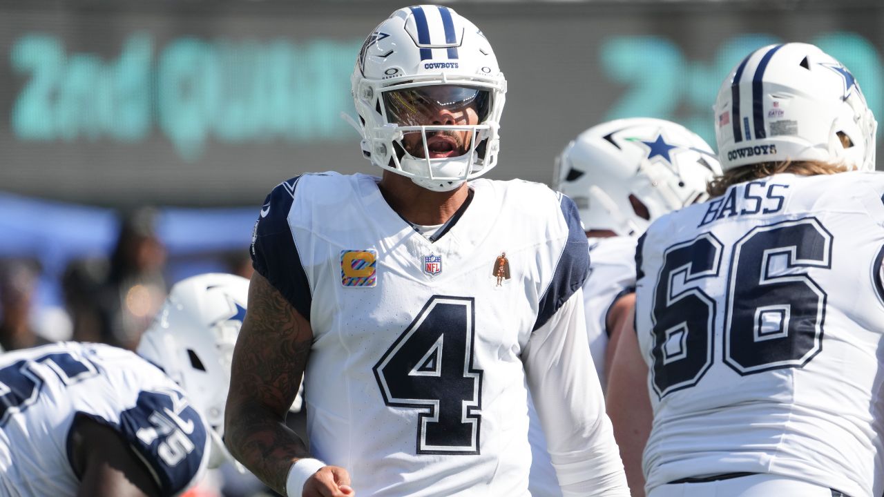 Dallas Cowboys quarterback Dak Prescott (4) looks towards the sidelines during the first half against the New York Jets at MetLife Stadium.