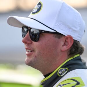 Sep 6, 2025; Madison, Illinois, USA; NASCAR Cup Series driver Noah Gragson (4) looks on during practice and qualifying for the Enjoy Illinois 300 at World Wide Technology Raceway