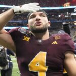 Arizona State running back Cam Skattebo (4) blows a kiss toward fans after Texas won 39-31 in double overtime in the Chick-fil-A Peach Bowl in Atlanta on Jan. 1, 2025.
