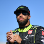 Oct 11, 2025; Las Vegas, Nevada, USA; NASCAR Cup Series driver Bubba Wallace (23) during qualifying for the South Point 400 at Las Vegas Motor Speedway. Mandatory Credit: Gary A. Vasquez-Imagn Images