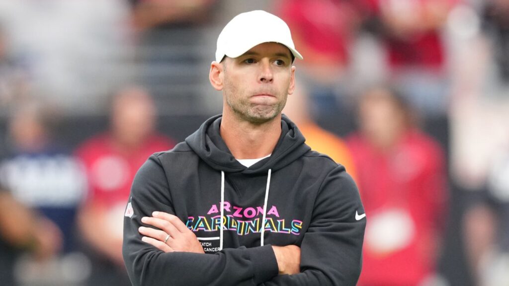 Arizona Cardinals head coach Jonathan Gannon stands on the field before their game against the Tennessee Titans at State Farm Stadium.