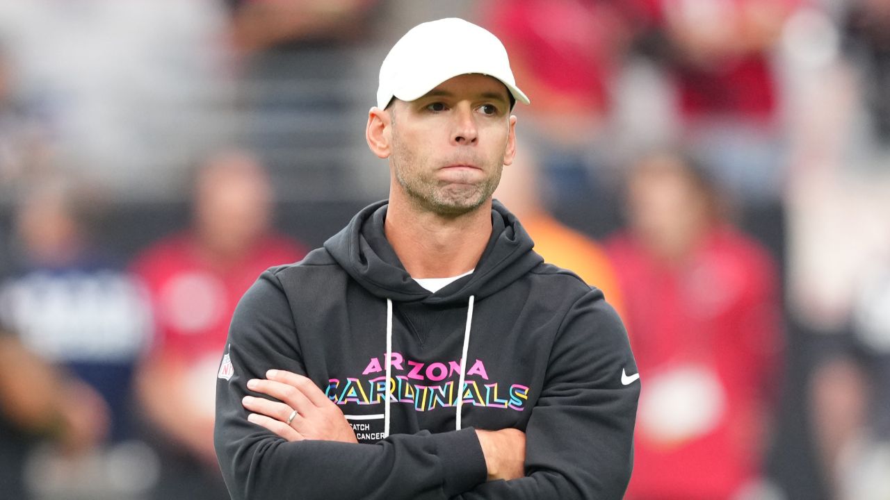 Arizona Cardinals head coach Jonathan Gannon stands on the field before their game against the Tennessee Titans at State Farm Stadium.