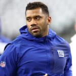 New York Giants quarterback Russell Wilson (3) warms up before the game against the Dallas Cowboys at AT&T Stadium.