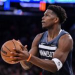 Oct 9, 2025; New York, New York, USA; Minnesota Timberwolves guard Anthony Edwards (5) shoots the ball against the New York Knicks during the first half at Madison Square Garden.