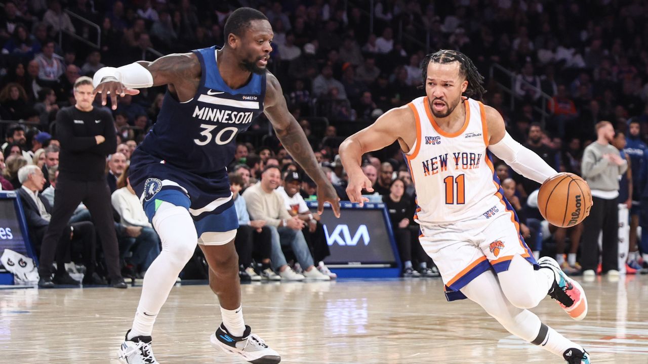 New York Knicks guard Jalen Brunson (11) looks to drive past Minnesota Timberwolves forward Julius Randle (30) in the fourth quarter at Madison Square Garden.