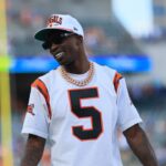 Former Cincinnati Bengals wide receiver Chad Johnson walks on the field prior to a game against the Detroit Lions at Paycor Stadium.