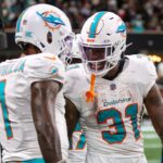 Tua Tagovailoa and Ollie Gordon II