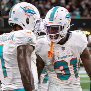 Tua Tagovailoa and Ollie Gordon II