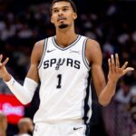 Oct 24, 2025; New Orleans, Louisiana, USA; San Antonio Spurs forward/center Victor Wembanyama (1) reacts to being fouled by New Orleans Pelicans center Derik Queen (not pictured) during the second half at Smoothie King Center.