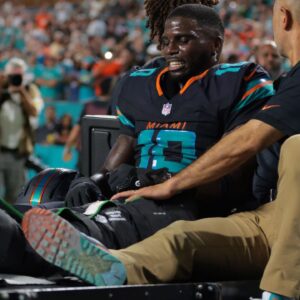 Miami Dolphins wide receiver Tyreek Hill (10) reacts after being placed on a medical cart against the New York Jets during the second half at Hard Rock Stadium.
