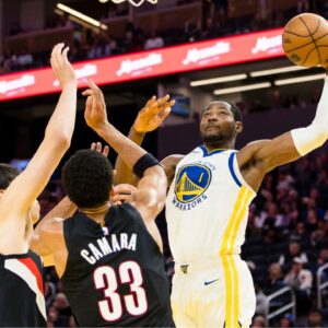 Golden State Warriors forward Jonathan Kuminga (1) shoots as Portland Trail Blazers forward Toumani Camara (33) defends during the third quarter at Chase Center