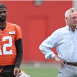 Cleveland Browns quarterback Shedeur Sanders (12) and managing and principal partner Jimmy Haslam watch a play during minicamp at CrossCountry Mortgage Campus.