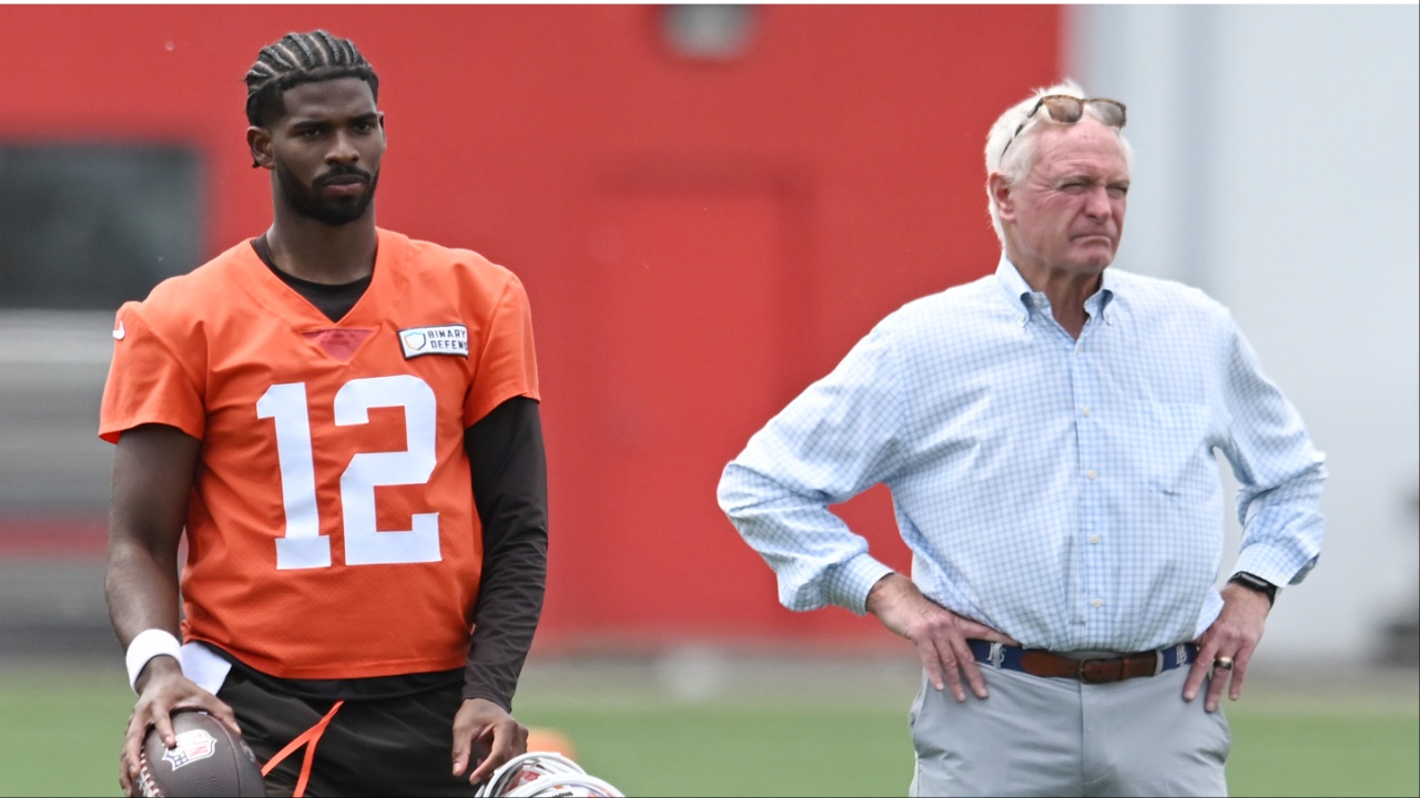 Cleveland Browns quarterback Shedeur Sanders (12) and managing and principal partner Jimmy Haslam watch a play during minicamp at CrossCountry Mortgage Campus.