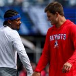 New England Patriots quarterback Drake Maye (10) and New England Patriots wide receiver Stefon Diggs (8) before the game against the Pittsburgh Steelers at Gillette Stadium.