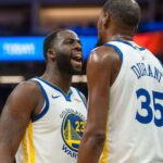 Dec 14, 2018; Sacramento, CA, USA; Golden State Warriors forward Draymond Green (23) and forward Kevin Durant (35) celebrate after defeating the Sacramento Kings at Golden 1 Center.