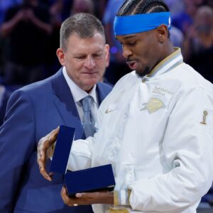 Oct 21, 2025; Oklahoma City, Oklahoma, USA; Oklahoma City Thunder guard Shai Gilgeous-Alexander looks at his championship ring during the ring ceremony before the start of their game against the Houston Rockets at Paycom Center.