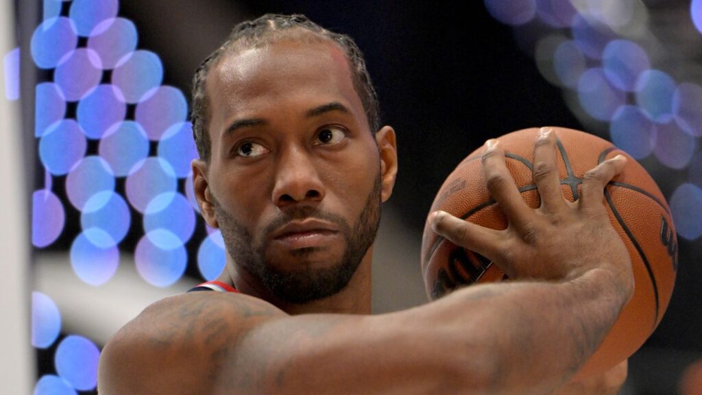 Los Angeles Clippers forward Kawhi Leonard (2) poses during media day at Intuit Dome.
