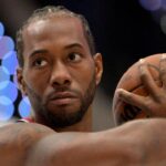 Los Angeles Clippers forward Kawhi Leonard (2) poses during media day at Intuit Dome.