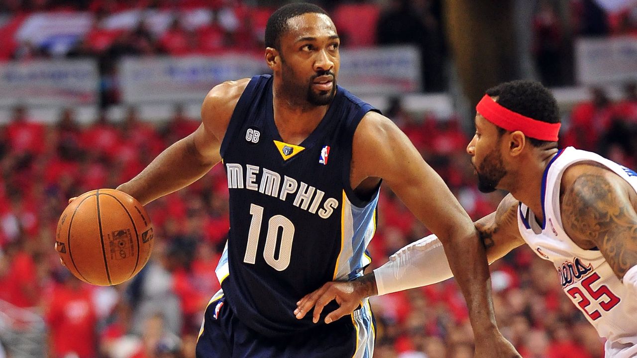 Memphis Grizzlies point guard Gilbert Arenas (10) controls the ball against the defense of Los Angeles Clippers point guard Mo Williams (25) during the first half of game four of the Western Conference quarterfinals of the 2012 NBA Playoffs at Staples Center.