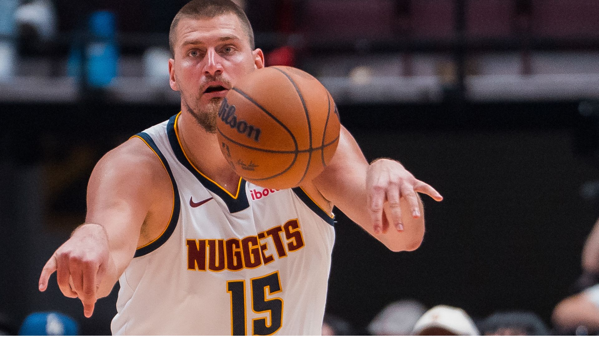 Oct 6, 2025; Vancouver, British Columbia, CAN; Denver Nuggets center Nikola Jokic (15) makes a pass against the Toronto Raptors in the second half at Rogers Arena