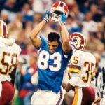 Buffalo Bills receiver Andre Reed (83) throws his helmet after not getting a pass interference call during Super Bowl XXVI against the Buffalo Bills at the Metrodome. The Redskins defeated the Bills 37-24.