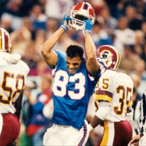 Buffalo Bills receiver Andre Reed (83) throws his helmet after not getting a pass interference call during Super Bowl XXVI against the Buffalo Bills at the Metrodome. The Redskins defeated the Bills 37-24.