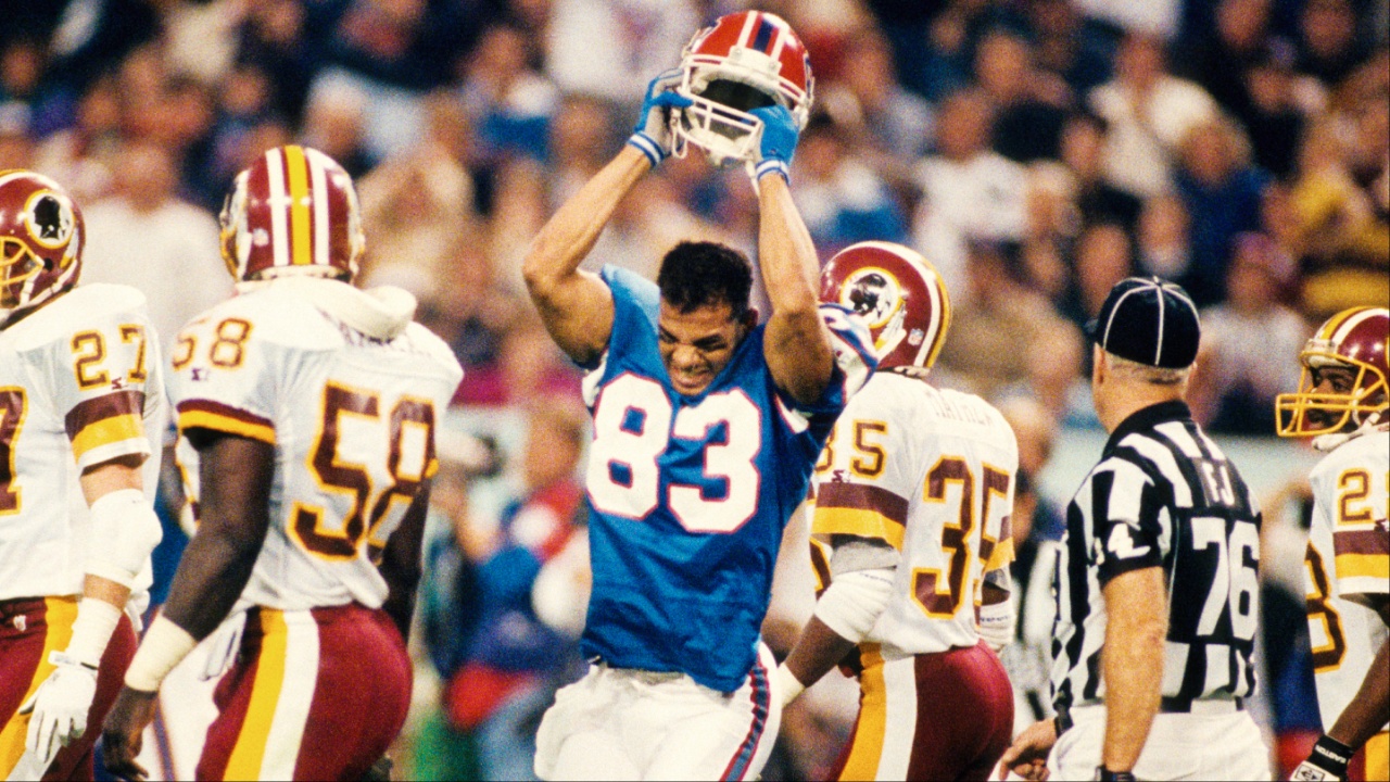 Buffalo Bills receiver Andre Reed (83) throws his helmet after not getting a pass interference call during Super Bowl XXVI against the Buffalo Bills at the Metrodome. The Redskins defeated the Bills 37-24.