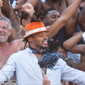 Auburn's mens basketball coach Bruce Pearl greets Auburn alum NFL quarterback Cam Newton at Jordan-Hare Stadium