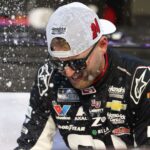 Oct 26, 2025; Martinsville, Virginia, USA; NASCAR Cup Series driver William Byron (24) celebrates his win following the Xfinity 500 at Martinsville Speedway