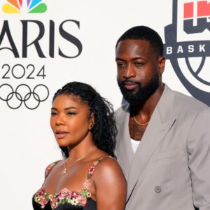 Aug 5, 2024; Paris, FRANCE; Dwyane Wade and wife Gabrielle Union pose for a photograph during the Paris 2024 Olympic Summer Games at Team USA House