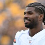 Cleveland Browns quarterback Shedeur Sanders (12) watches the action against the Pittsburgh Steelers during the fourth quarter at Acrisure Stadium.