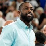 Dwyane Wade looks on at halftime between France and Canada in a men’s basketball quarterfinal game during the Paris 2024 Olympic Summer Games at Accor Arena.