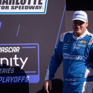 Oct 4, 2025; Concord, North Carolina, USA; NASCAR Xfinity Series driver Austin Hill (21) is introduced at Charlotte Motor Speedway Road Course.