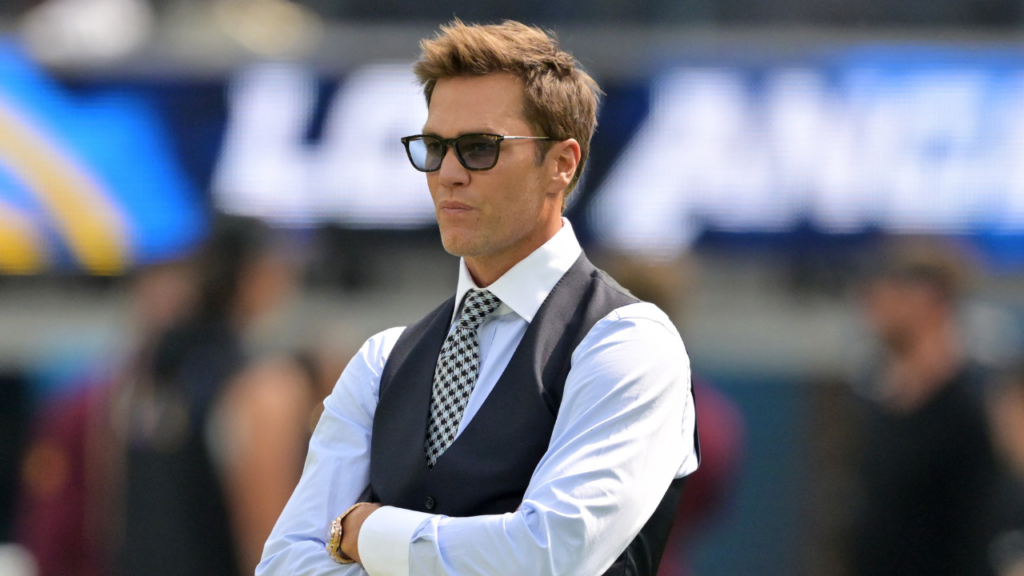 Tom Brady looks on before the game between the Los Angeles Chargers and the Washington Commanders at SoFi Stadium.