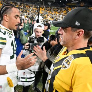 Pittsburgh Steelers quarterback Aaron Rodgers (8) and Green Bay Packers quarterback Jordan Love (10) shake hands after the game at Acrisure Stadium.