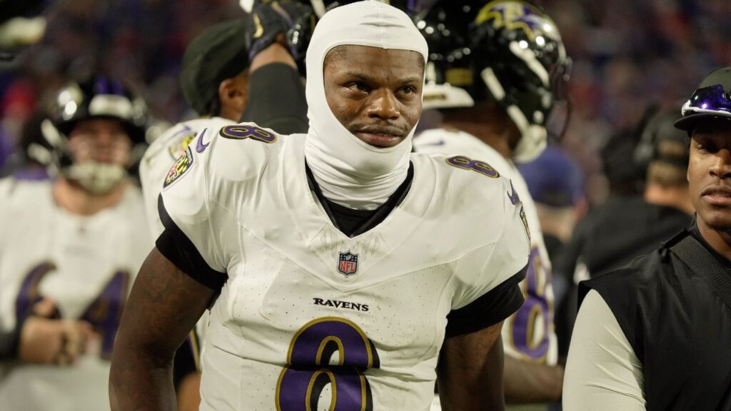 Baltimore Ravens quarterback Lamar Jackson gets ready to take the field during the second half of their game against the Baltimore Ravens at Highmark Stadium in Orchard Park on Sept. 7, 2025.