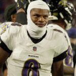 Baltimore Ravens quarterback Lamar Jackson gets ready to take the field during the second half of their game against the Baltimore Ravens at Highmark Stadium in Orchard Park on Sept. 7, 2025.