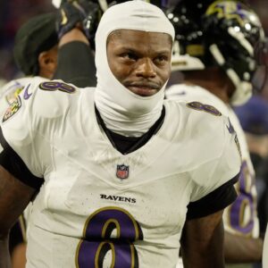 Baltimore Ravens quarterback Lamar Jackson gets ready to take the field during the second half of their game against the Baltimore Ravens at Highmark Stadium in Orchard Park on Sept. 7, 2025.
