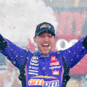 Oct 12, 2025; Las Vegas, Nevada, USA; NASCAR Cup Series driver Denny Hamlin (11) celebrates his victory following the South Point 400 at Las Vegas Motor Speedway. Mandatory Credit: Gary A. Vasquez-Imagn Images