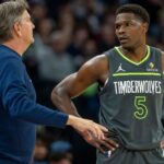 Dec 21, 2024; Minneapolis, Minnesota, USA; Minnesota Timberwolves head coach Chris Finch talks with Minnesota Timberwolves guard Anthony Edwards (5) against the Golden State Warriors in the first half at Target Center.
