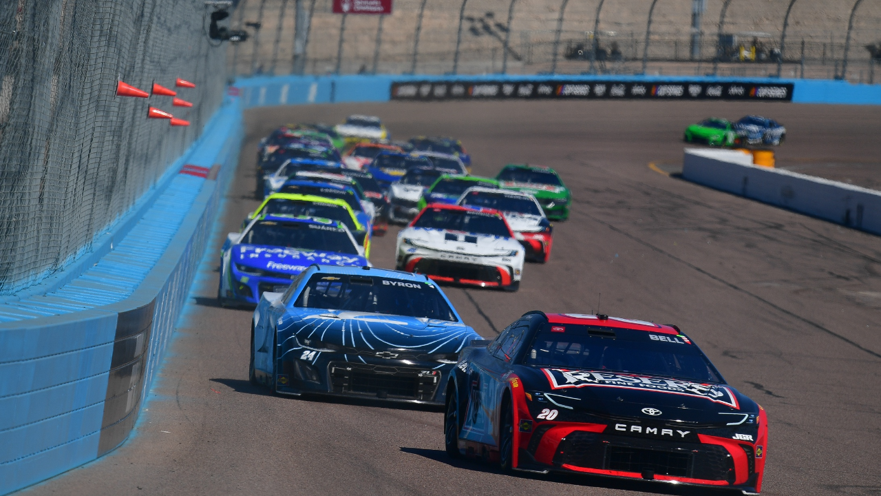 Mar 9, 2025; Avondale, Arizona, USA; NASCAR Cup Series driver Christopher Bell (20) leads driver William Byron (24) and the field for the restart of the Shriners Children’s 500 at Phoenix Raceway. Mandatory Credit: Gary A. Vasquez-Imagn Images
