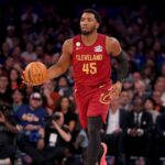 Oct 22, 2025; New York, New York, USA; Cleveland Cavaliers guard Donovan Mitchell (45) brings the ball up court against the New York Knicks during the first quarter at Madison Square Garden.