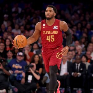 Oct 22, 2025; New York, New York, USA; Cleveland Cavaliers guard Donovan Mitchell (45) brings the ball up court against the New York Knicks during the first quarter at Madison Square Garden.